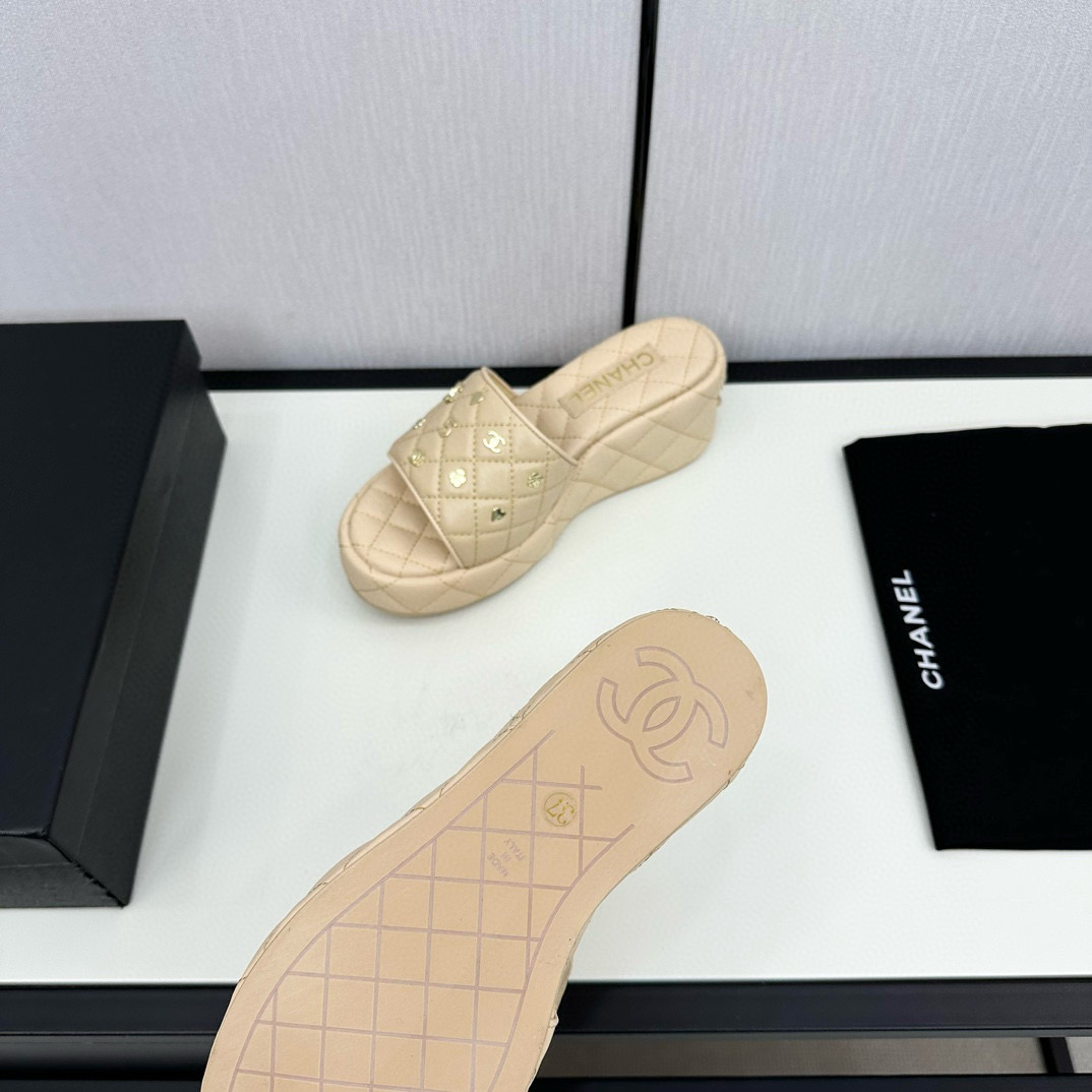 CHANEL hardware embroidered wedge slippers