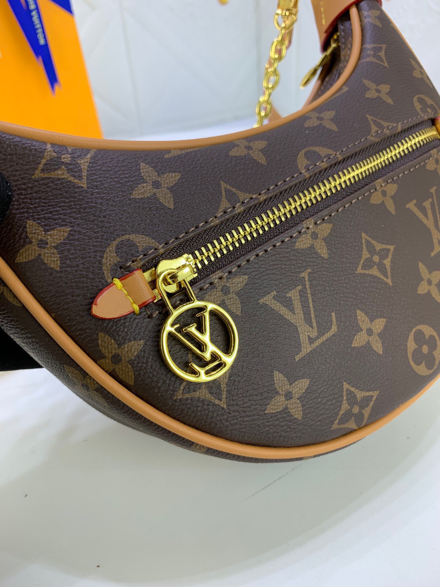 Louis Vuitton loop Half moon baguette bag
