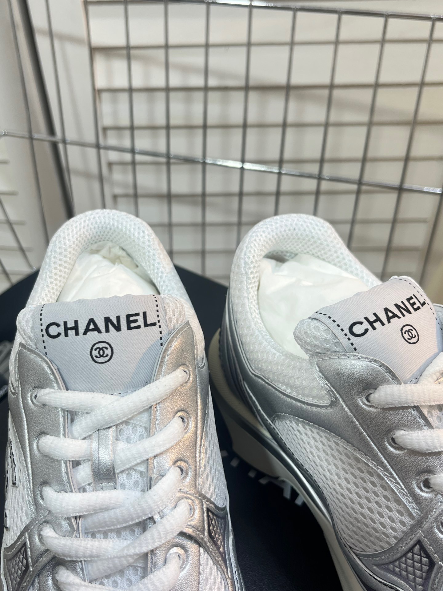 CHANEL Gold and silver horn king sneakers