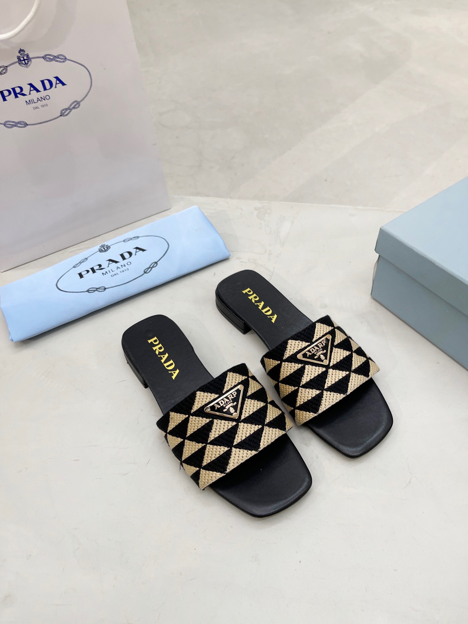 PRADA Triangle printed fabric slippers