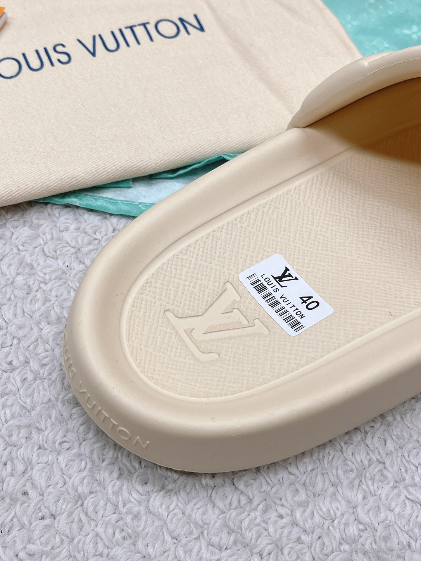 LOUIS VUITTON SLIDES