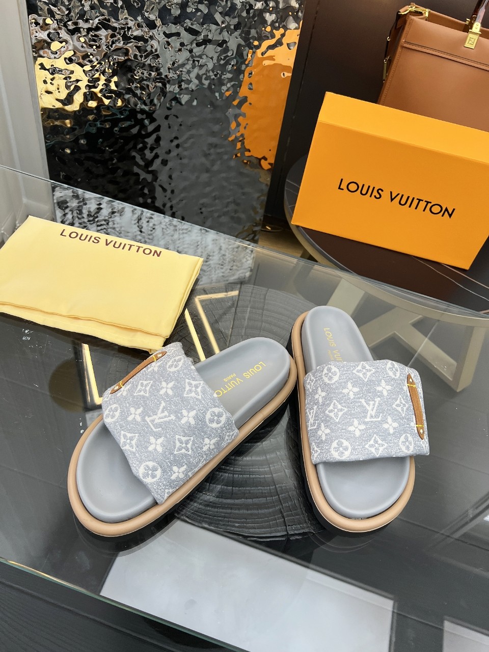 LOUIS VUITTON SLIDES