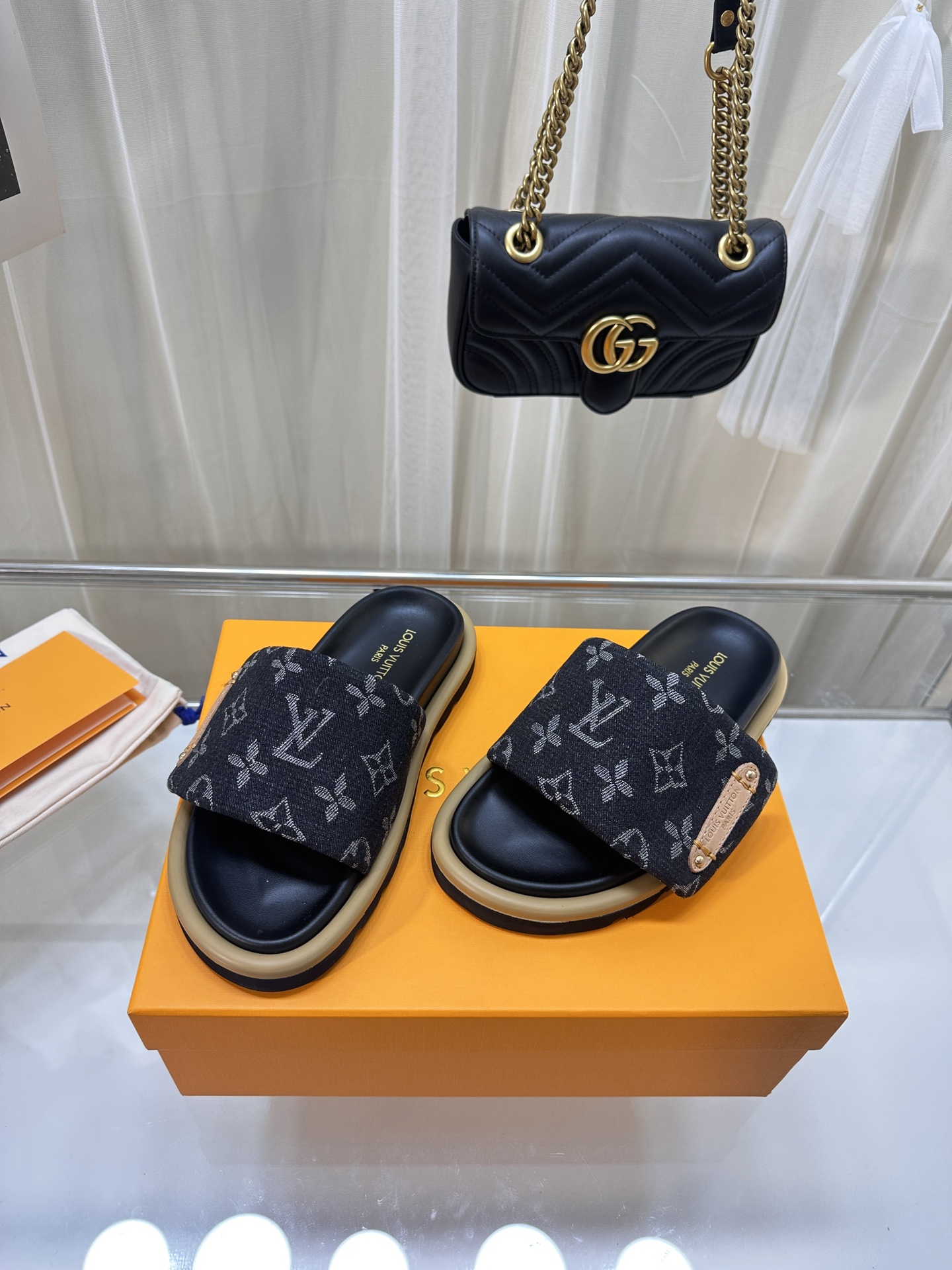 LOUIS VUITTON SLIDES