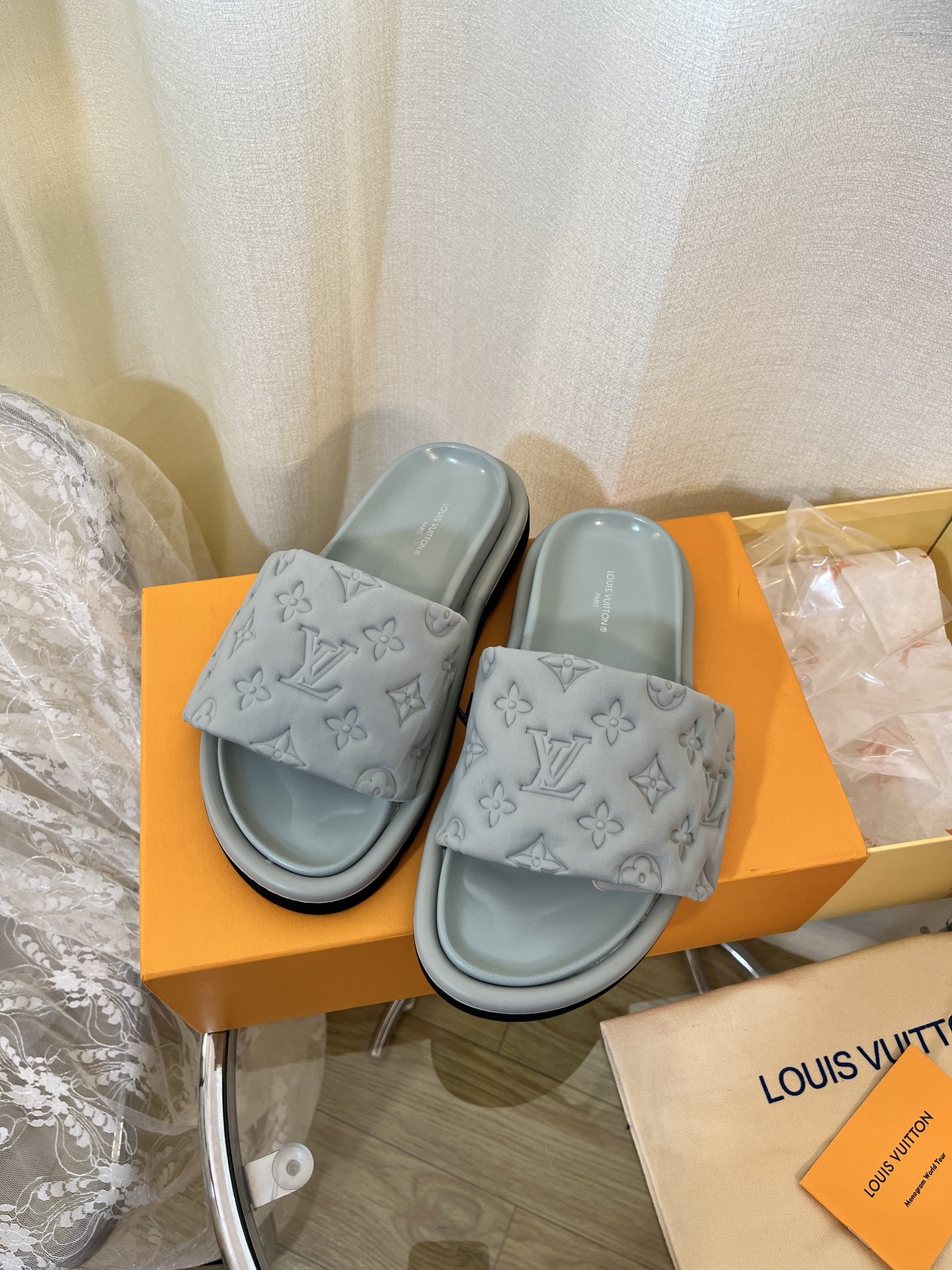 LOUIS VUITTON SLIDES