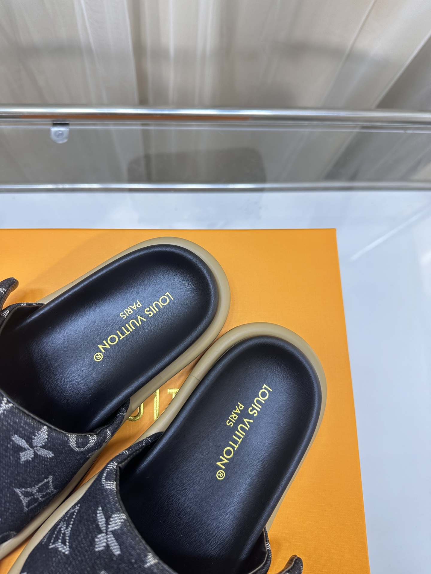 LOUIS VUITTON SLIDES