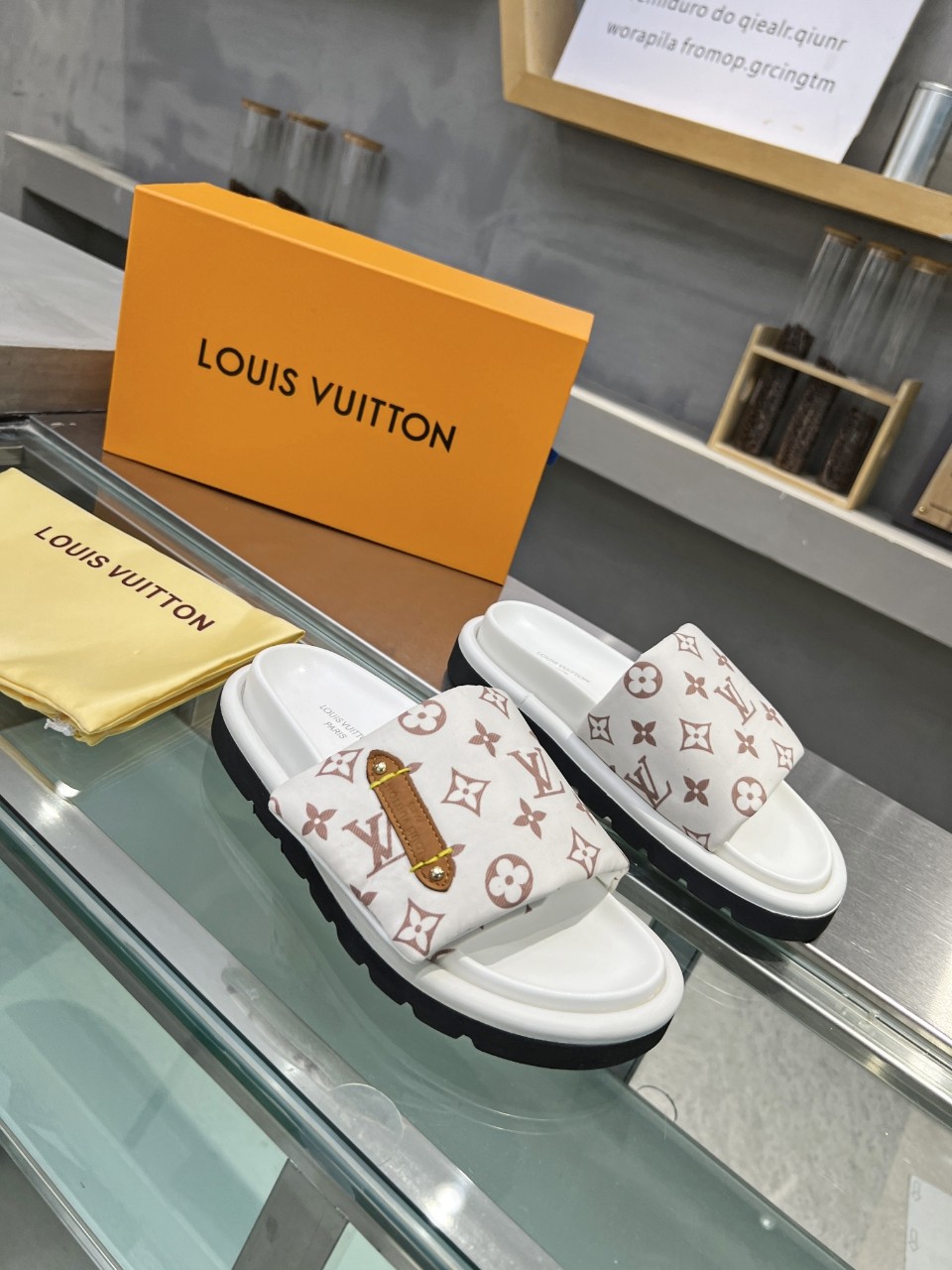 LOUIS VUITTON SLIDES