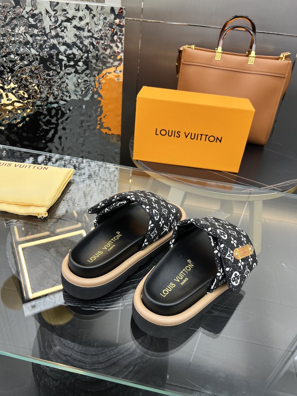 LOUIS VUITTON SLIDES