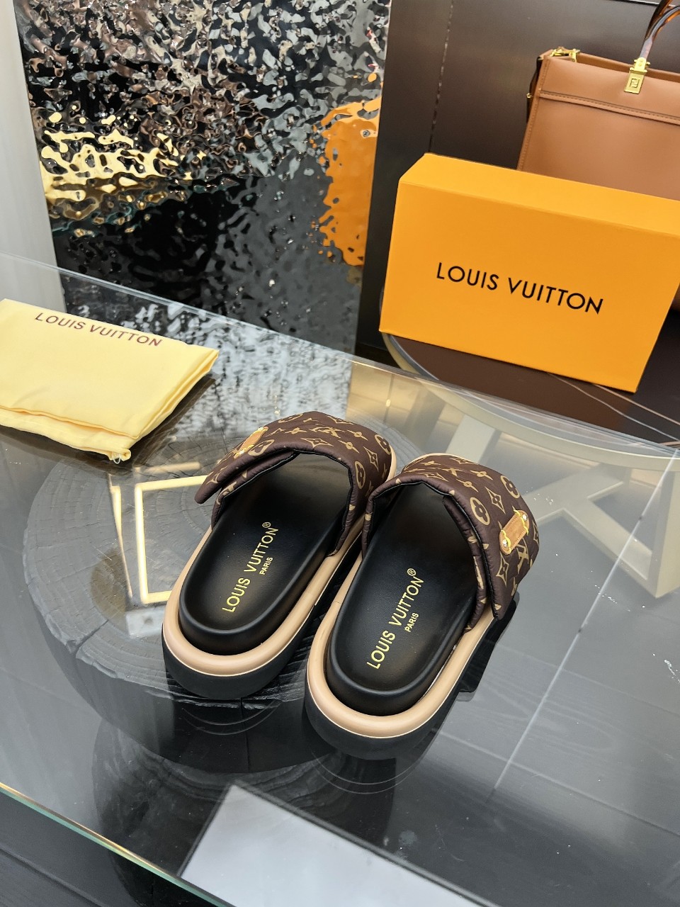 LOUIS VUITTON SLIDES