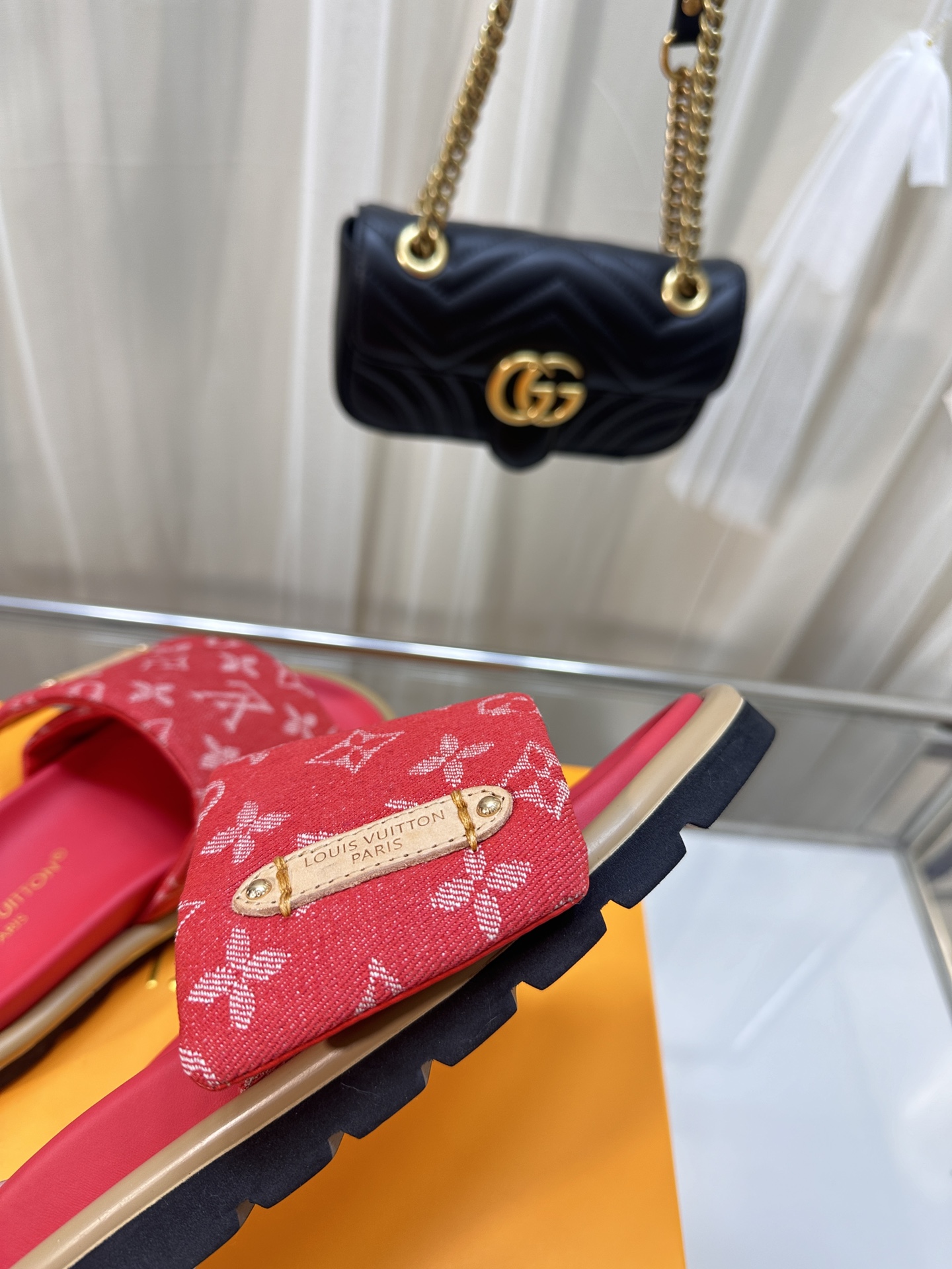 LOUIS VUITTON SLIDES