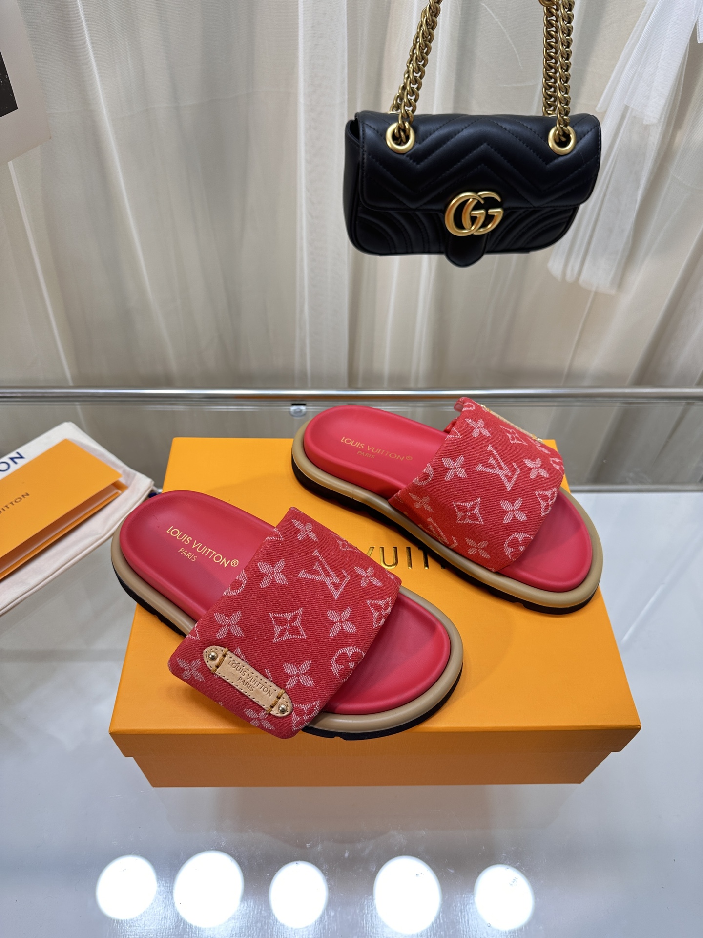 LOUIS VUITTON SLIDES